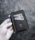 Portofel talon auto negru Gold Edition, vedere oblică cu talon și carduri, ață galbenă, logo gold, piele naturală, handmade România